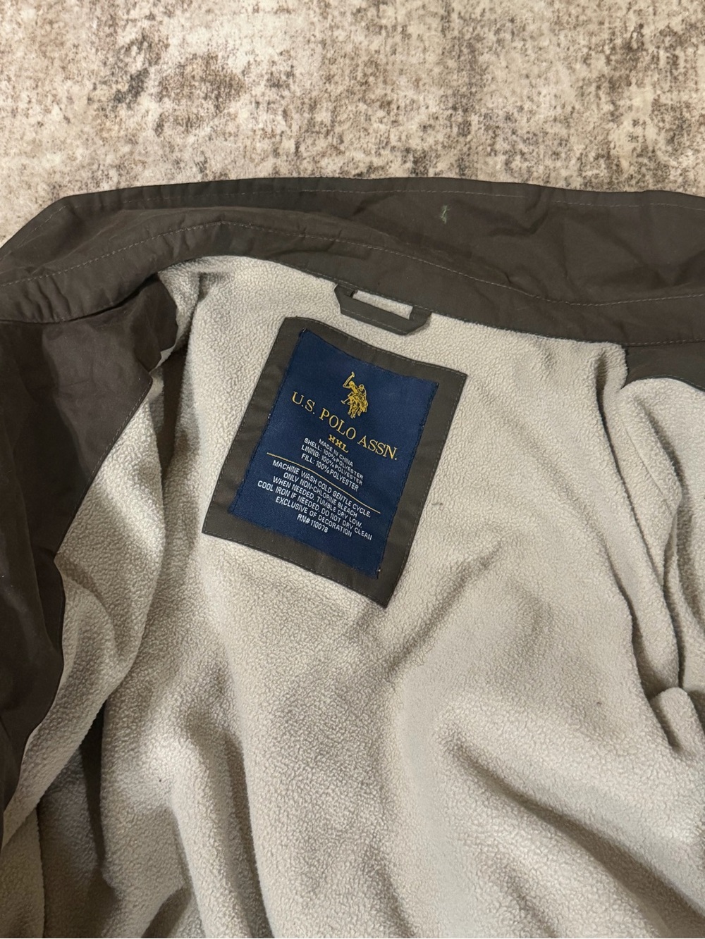 U.S. Polo Assn. Black Puffer Jacket with Light Gray Fleece Interior